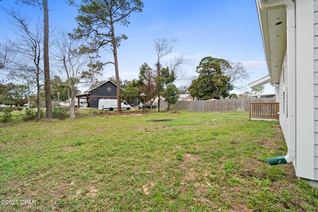 view of yard with fence