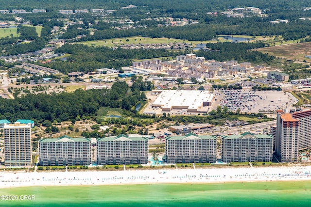 bird's eye view featuring a beach view and a water view