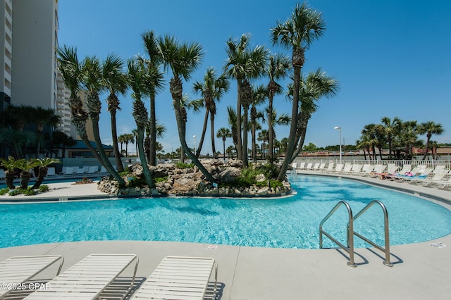 pool with a patio area