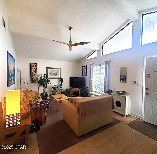 living area with tile patterned flooring, vaulted ceiling with beams, visible vents, and ceiling fan