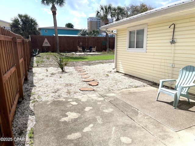 view of patio with a fenced backyard