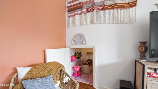 bedroom with wood finished floors