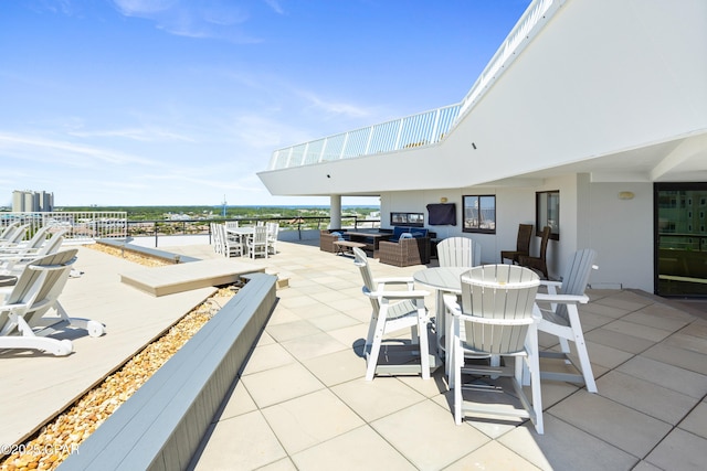 view of patio featuring outdoor dining area