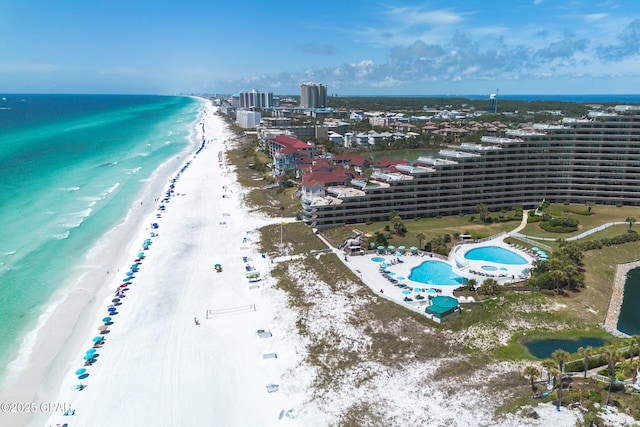 bird's eye view with a city view, a beach view, and a water view