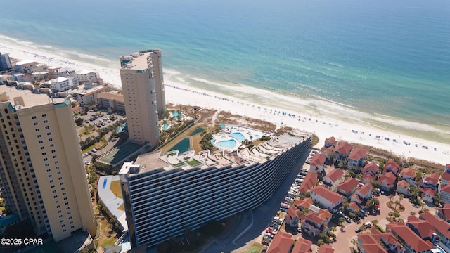 aerial view featuring a water view and a beach view