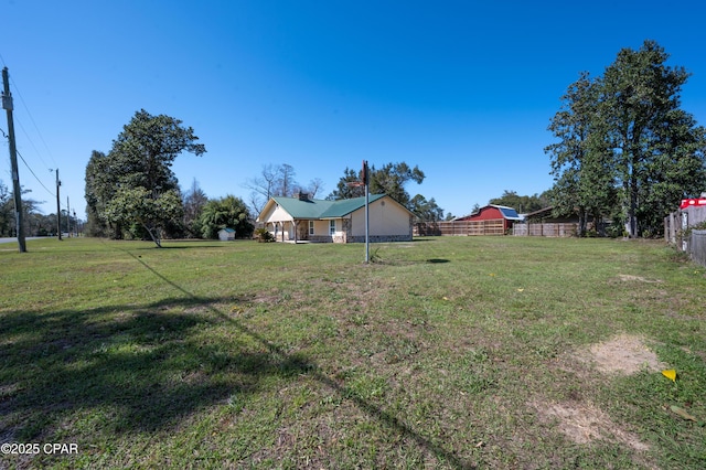 view of yard featuring fence