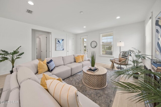 2009 Calamint St, Panama City, FL 32405 - living area featuring wood finished floors, recessed lighting, and baseboards