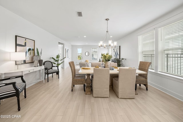 2009 Calamint St, Panama City, FL 32405 - dining room featuring a chandelier, light wood-style floors, recessed lighting, and baseboards