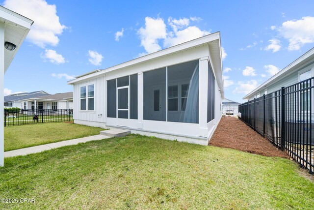 2009 Calamint St, Panama City, FL 32405 - back of house featuring a sunroom