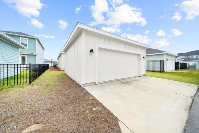 garage featuring fence