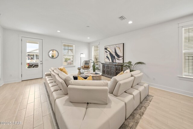 2009 Calamint St, Panama City, FL 32405 - living area featuring light wood-type flooring, baseboards, and recessed lighting