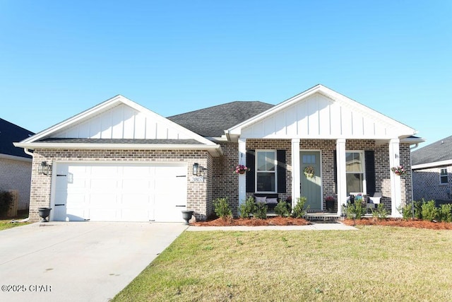 view of front of house featuring a garage, brick siding, concrete driveway, and a front lawn