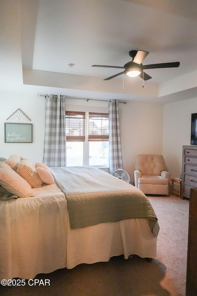 bedroom with carpet floors and a ceiling fan