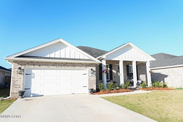 view of front of home featuring concrete driveway, a garage, brick siding, and board and batten siding