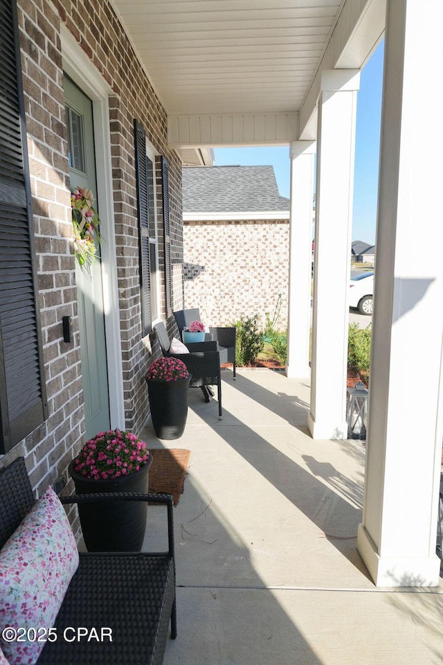 view of patio featuring covered porch