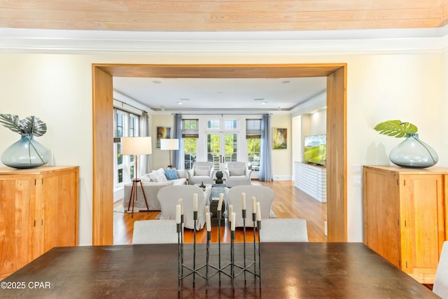 239 Sand Oaks Cir, Santa Rosa Beach, FL 32459 - dining area with crown molding and wood finished floors