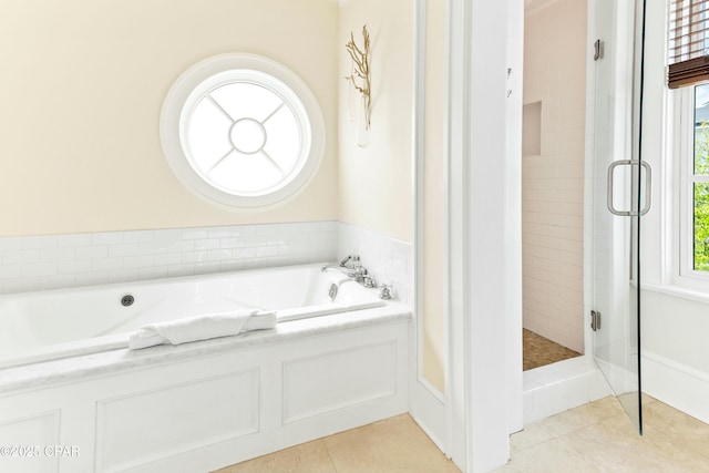 239 Sand Oaks Cir, Santa Rosa Beach, FL 32459 - full bathroom featuring a bath, tile patterned floors, and a stall shower