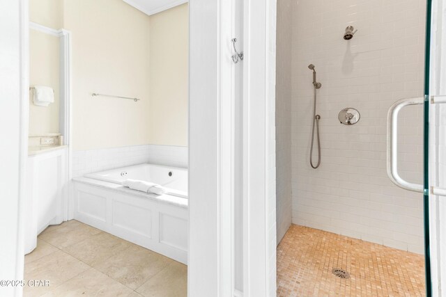 239 Sand Oaks Cir, Santa Rosa Beach, FL 32459 - bathroom featuring a garden tub, a stall shower, and tile patterned flooring
