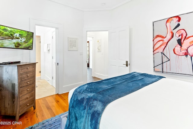 239 Sand Oaks Cir, Santa Rosa Beach, FL 32459 - bedroom featuring wood finished floors