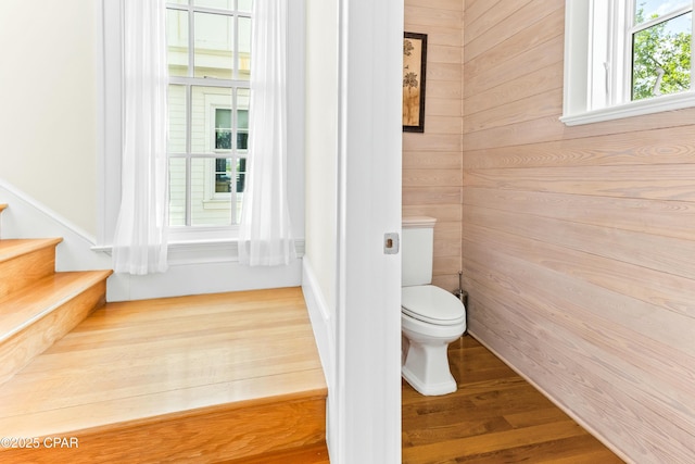 239 Sand Oaks Cir, Santa Rosa Beach, FL 32459 - bathroom featuring wood finished floors, toilet, and wood walls