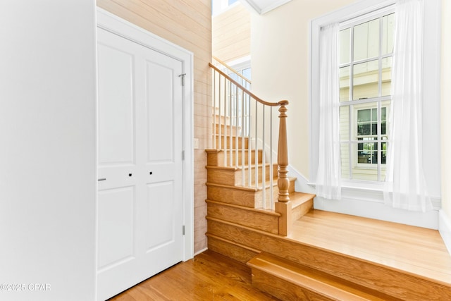 239 Sand Oaks Cir, Santa Rosa Beach, FL 32459 - stairway featuring wood finished floors