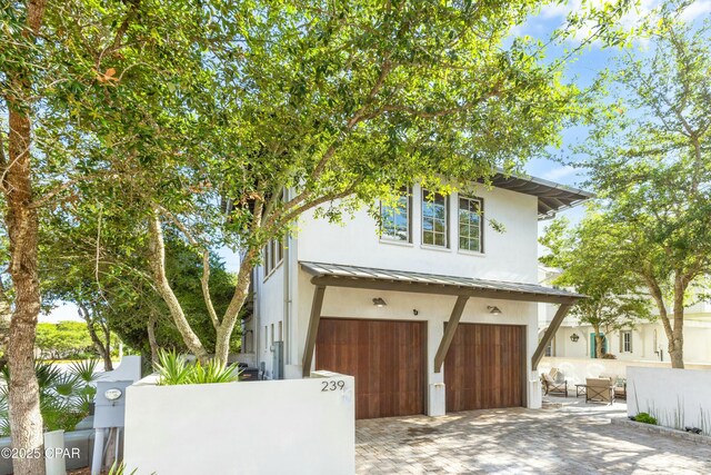 239 Sand Oaks Cir, Santa Rosa Beach, FL 32459 - garage with fence