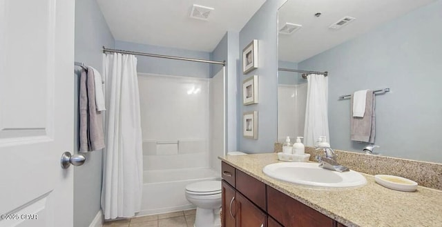 bathroom with vanity, tile patterned floors, toilet, and visible vents