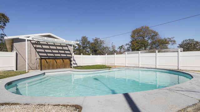 view of swimming pool featuring a fenced in pool and a fenced backyard