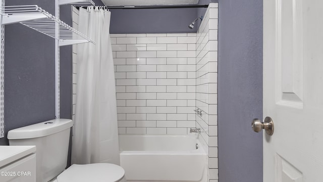 bathroom featuring vanity, toilet, and shower / bath combo