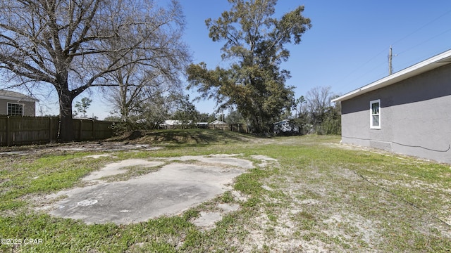 view of yard featuring fence