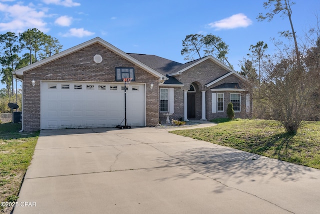 view of front facade with a front lawn, brick siding, a garage, and driveway