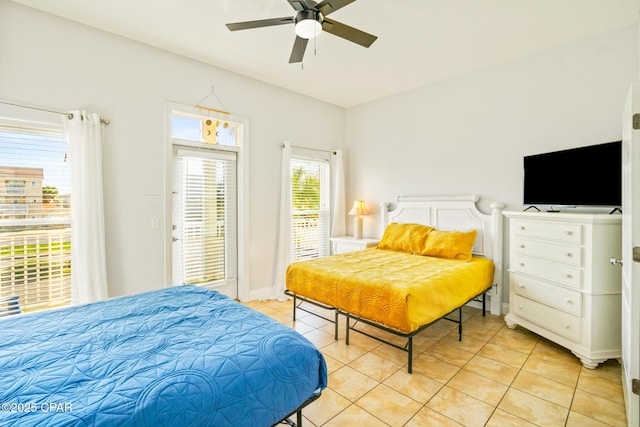 bedroom with light tile patterned flooring and ceiling fan