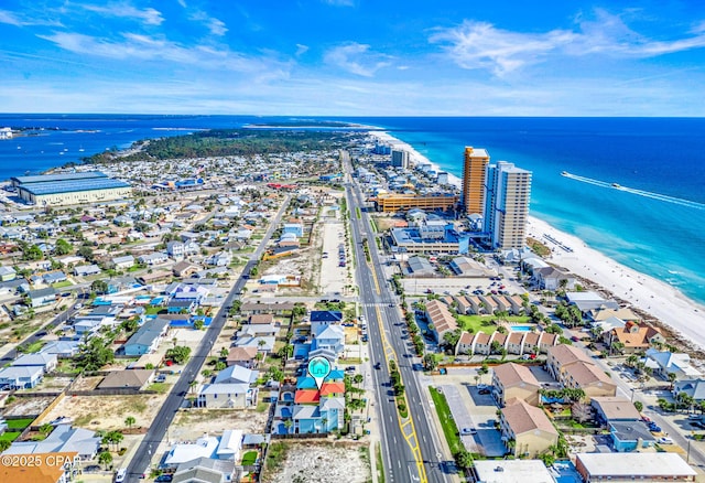 bird's eye view featuring a view of the beach and a water view