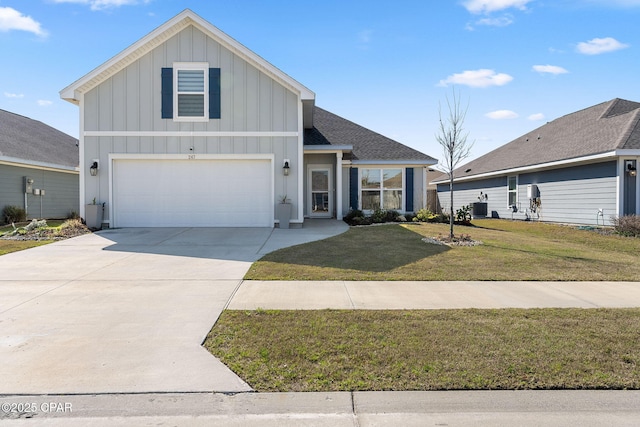 view of front of house featuring board and batten siding, a shingled roof, a front lawn, central AC, and driveway