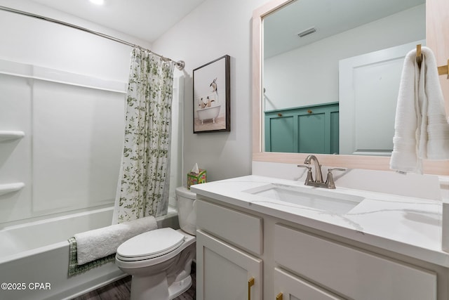 full bath featuring vanity, shower / bath combination with curtain, toilet, and visible vents