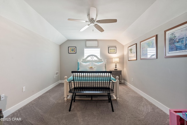 bedroom with baseboards, lofted ceiling, and carpet flooring