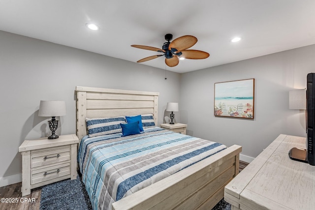 bedroom featuring dark wood finished floors, recessed lighting, a ceiling fan, and baseboards