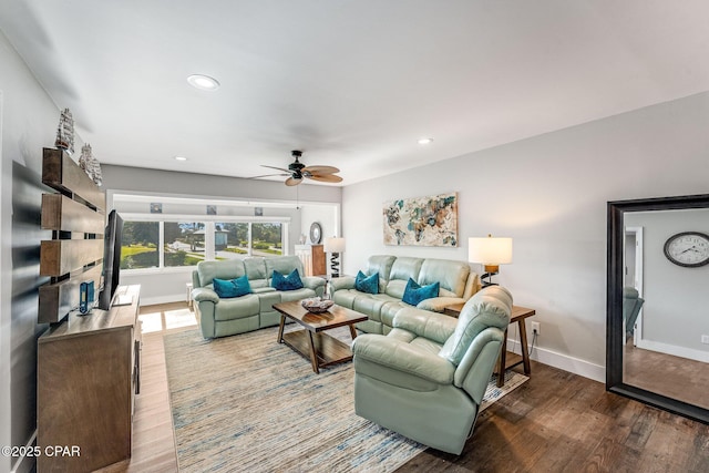 living area featuring recessed lighting, ceiling fan, baseboards, and wood finished floors