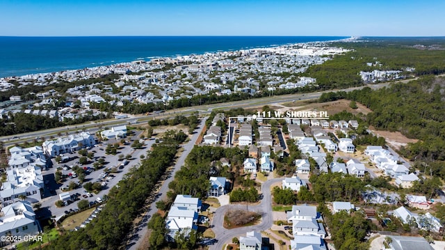 bird's eye view with a residential view and a water view