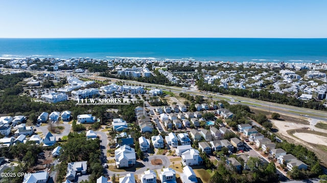 bird's eye view with a residential view and a water view