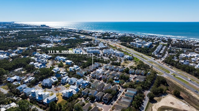 bird's eye view with a water view and a residential view