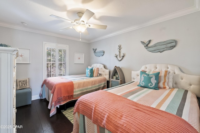 bedroom featuring ceiling fan, baseboards, dark wood-type flooring, and ornamental molding