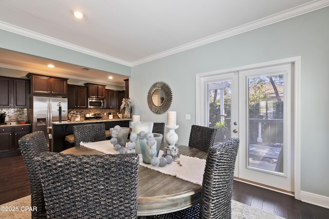dining area with dark wood finished floors, recessed lighting, and ornamental molding
