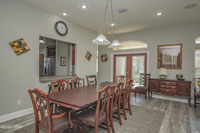 dining area featuring visible vents, recessed lighting, french doors, and wood finished floors