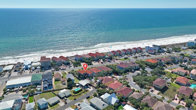 bird's eye view with a beach view, a residential view, and a water view