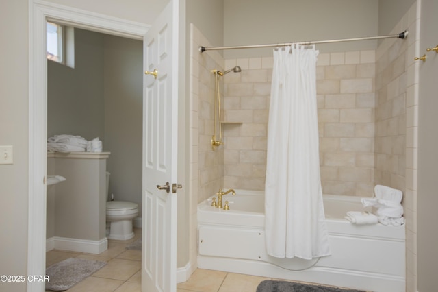 full bathroom featuring tile patterned floors, toilet, and shower / bathtub combination with curtain