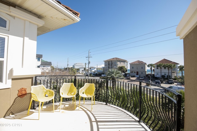 balcony featuring a residential view