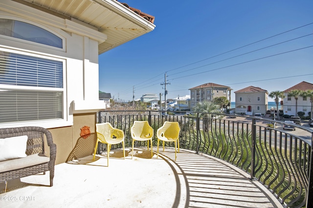 balcony featuring a residential view