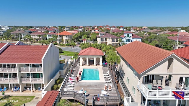 birds eye view of property with a residential view