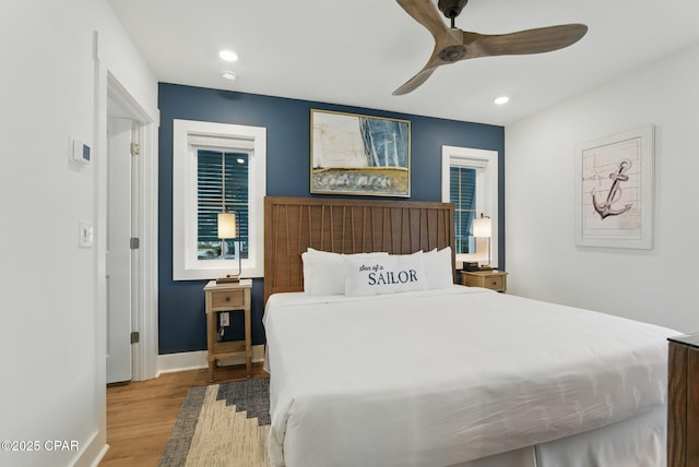 bedroom with recessed lighting, baseboards, wood finished floors, and ceiling fan